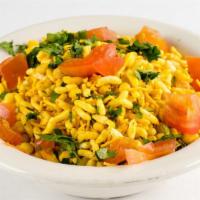 Bhel Puri · Gluten-free. Puffed rice, potatoes, onions, wafers, and crisp noodles served with chutney.