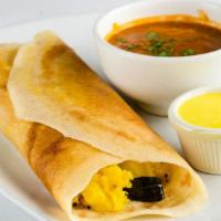 Masala Dosa · Gluten-free. A rice flour crepe stuffed with lightly cooked potatoes, onions, coriander, and...