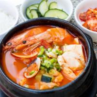 Tofu Soup (Soon Tofu) · Soon tofu is Korean stew made with tofu and a raw egg is put in the stew while it is still b...