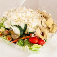 Greek Salad · Lettuce, tomatoes, cheese, artichoke hearts, olives, cucumbers, broccoli, celery, and feta c...