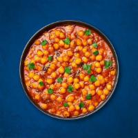 Chickpea Supreme · Chickpeas, slow-cooked till soft in an onion and tomato curry with Indian whole spices.