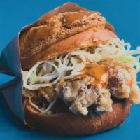 Sweet & Spicy Chicken Sandwich · crispy rice-battered chicken, shredded cabbage and huhu sauce on our homemade pineapple bun