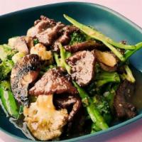 Broccoli & Beef (House Special) · black peppered grass-fed sirloin, organic broccoli + cauliflower + dino kale