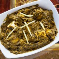 Saag Paneer · fresh spinach cooked with herbs & cheese.