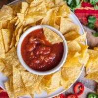 Chips & Salsa · Crispy tortilla chips with your choice of salsa.