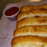 Breadsticks (6) · Served with marinara dipping sauce.