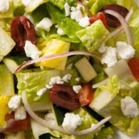 Greek Salad · A fresh and crispy bed of greens topped with an array of fresh diced vegetables and imported...