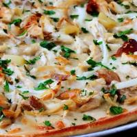 Chicken and Garlic Supreme Pizza · Cheese, creamy garlic sauce, chunks of chicken, sliced mushrooms, chopped tomatoes and onions.