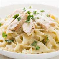 Chicken Fettuccine · Tender chicken strips with mushrooms and tomatoes in a cream sauce. Served with french bread...