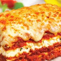 Meat Lasagna · Served with garlic bread and side salad.