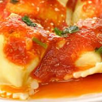 Ravioli with Marinara Sauce · Served with french bread and butter.