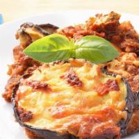 Eggplant Parmigiana Pasta · Layers of fresh eggplant baked with marinara sauce and topped with mozzarella cheese. Served...