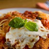 Chicken Parmigiana Dinner · Breaded and baked in tomato sauce and topped with mozzarella cheese. Served with spaghetti.