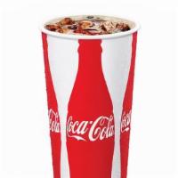 Coca-Cola Can · Enjoy Coca-Cola's crisp, delicious taste with meals, on the go, or to share. Serve ice cold ...
