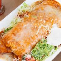 Super Famoso Burrito · Topped with enchilada sauce, cheese, sour cream, and guacamole. Served with rice, beans, and...