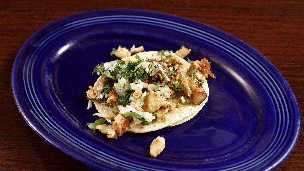 Regular Taco · Your choice of meat, onions, cilantro, and salsa.