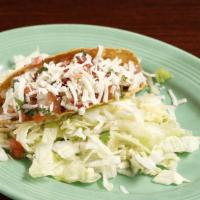 Crispy Taco · Your choice of meat, lettuce, cheese, pico de gallo, sour cream, and salsa.