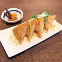 Vegetarian Samosas (4) · Pastry turnovers filled with spiced potatoes, carrots and peas. Cannot be vegan, gluten free...