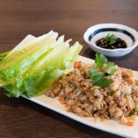 Lettuce Wrap · Sliced water chestnut, radish, mushrooms, green onions, carrots, with side of romaine lettuc...