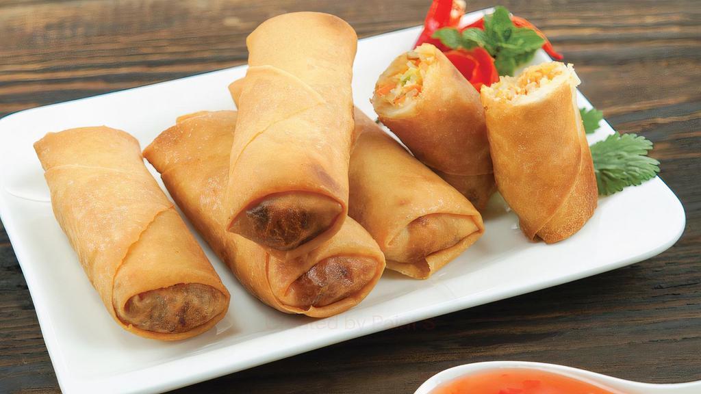 Fried Spring Rolls ปอทอด · Crispy spring rolls filled with vegetables and deep-fried to golden perfection served with plum sauce.