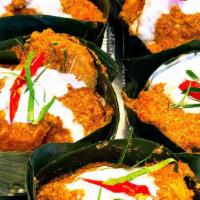 Hor Mok Pla(2 pieces) ห่อหมกปลา · Thai steamed curry with seasonal fish, coconut milk, and kaffir leaves