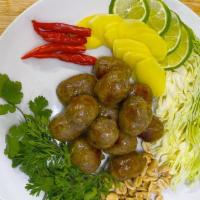 Sai Krok Esan (Esan Sausage) ไส้กรอกอีสาน · NorthEastern Thainstyle Fermented Sausages made with ground pork, garlic,cilantro root,
and ...