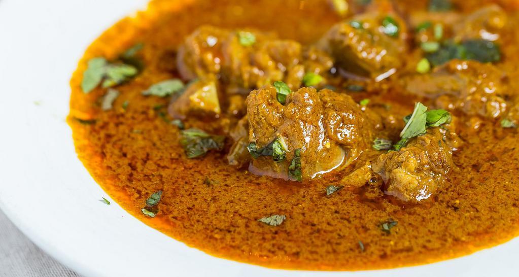 Lamb Curry · Medium spicy. Lamb cooked in a blend of traditional blend of curry spices.