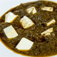 Palak Paneer · Medium spicy. Spinach cooked with home made cheese.