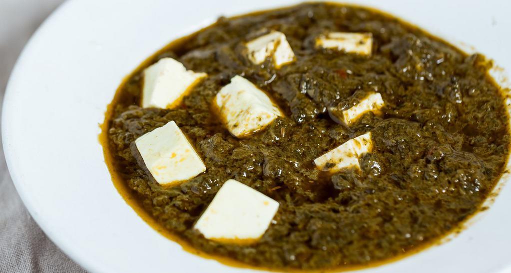 Palak Paneer · Medium. Spinach cooked w/ cheese cubes, herbs & flavored with Indian spices.