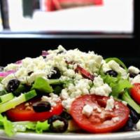 Greek · Romaine lettuce and mixed greens, tomatoes, cucumbers, red onions, olives, Feta cheese, gree...