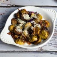 Roasted Brussel Sprouts · Roasted brussel sprouts cooked with bacon, red cabbage, garlic, lemon, Parmigiano Reggiano a...