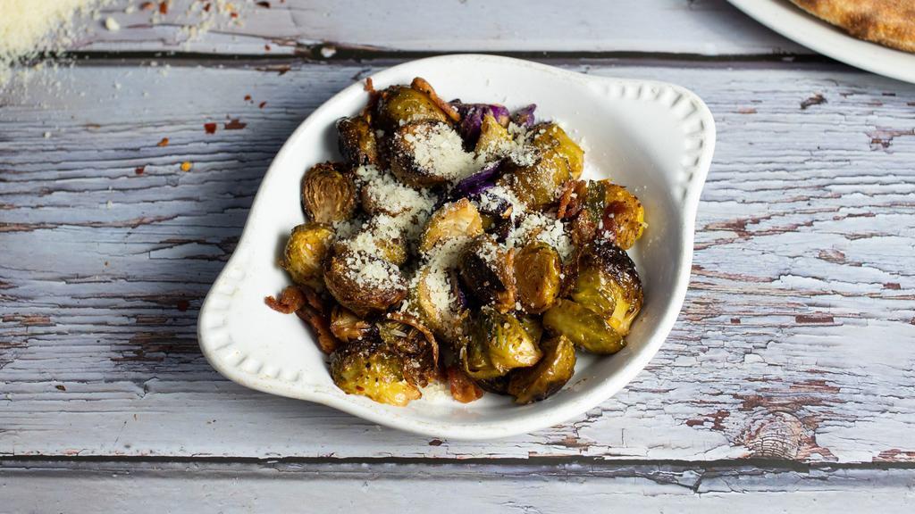 Roasted Brussels Sprouts · Bacon, red cabbage, garlic, lemon, Parmigiano and chili flakes.