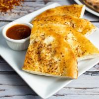 Florence's Garlic Focaccia with Marinara Dipping Sauce · Oven baked housemade Italian bread flavored with extra virgin olive oil & garlic and served ...