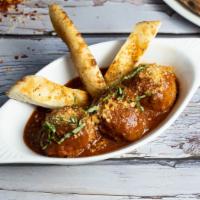 Peter'S Meatballs · Beef, pork and veal meatballs in house-made marinara sauce with focaccia bread, basil and Pa...