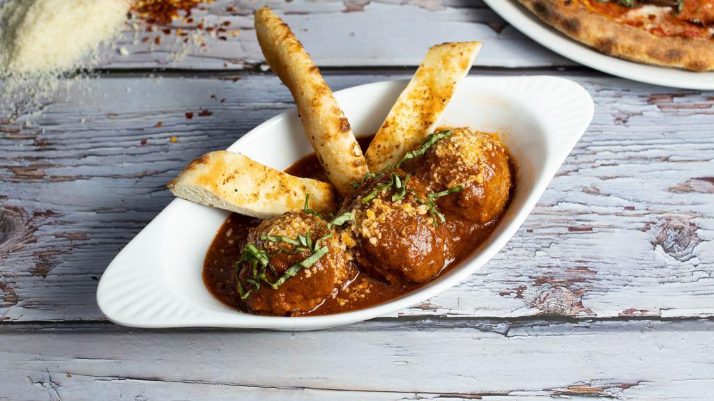 Peter'S Meatballs · Beef, pork and veal meatballs in house-made marinara sauce with focaccia bread, basil and Parmigiano.