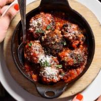 LAMB AND BEEF MEATBALLS.. · Fresh ground lamb and beef with spicy tomato sauce, mizithra cheese, mint