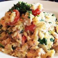 ORZO SALMON.. · Grilled salmon tossed with orzo pasta, cherry tomatoes, baby spinach, fresh dill, lemon, whi...