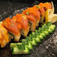007 · Deep fried CA roll topped with raw spicy tuna and fish eggs.
Sauce- unagi sauce, wasabi sauce