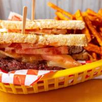 Patty Melt · 1/2 lb all Harris ranch beef topped with grilled onions, Cheddar and tomato on sliced sourdo...