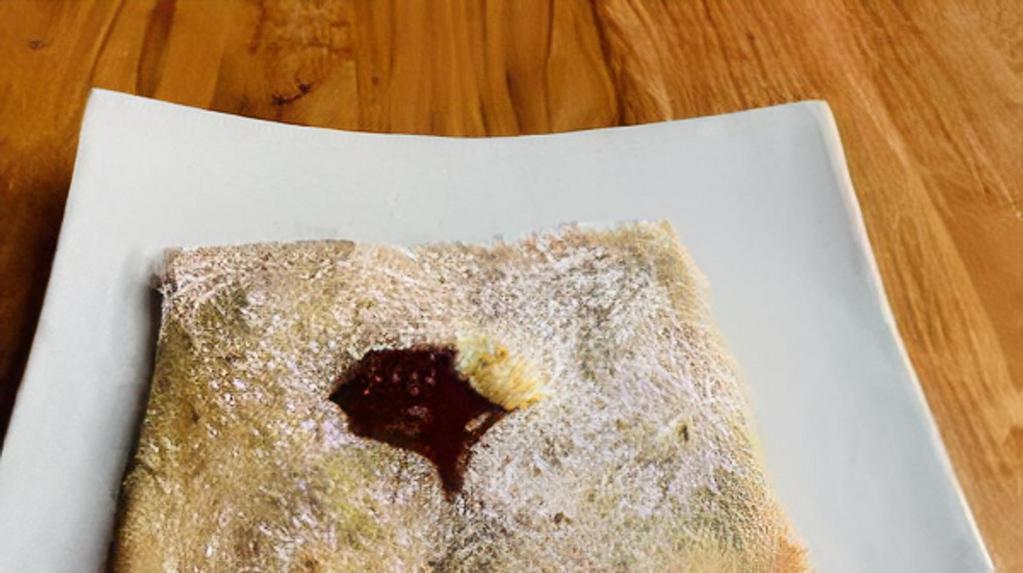 Raspberry jam with coulis Crepe. · Raspberry jam with coulis.