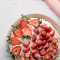 Strawberry Bagatelle · White cake with sliced fresh strawberries in a vanilla cream filling. Garnished with a half ...