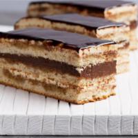 Opera Cake · A classic European dessert with a coffee soaked cake, coffee buttercream and a chocolate mou...