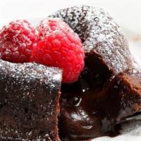 Molten Cake · A dense chocolate cake with a soft cream center when warmed for service.