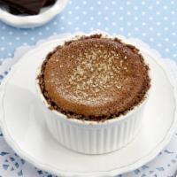 Chocolate Crème Brûlée · A buttery short dough tart shell filled with chocolate curls and crème brûlée, sprinkled wit...