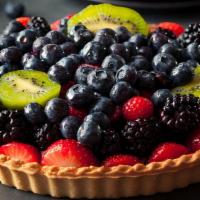Blackberry and Kiwi · A buttery short dough tart shell filled with creme patissiere, topped with blackberries, gar...