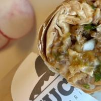 Regular Burrito · Choice of meat, spanish rice and pinto beans. With onion, cilantro and salsa.