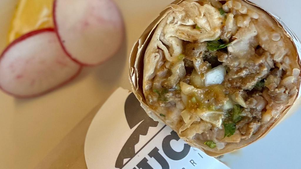 Regular Burrito · Choice of meat, spanish rice and pinto beans. With onion, cilantro and salsa.