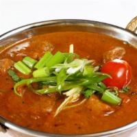 Tawa murgh karahi · Free range chicken boneless cooked with onion and tomatoes garlic ang turmeric