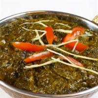 Murgh Palak  · Boneless free range chicken cooked with spinach and spices