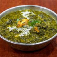 Palak Paneer · Freshly cooked cottage balls in creamy sauce with Indian spices.